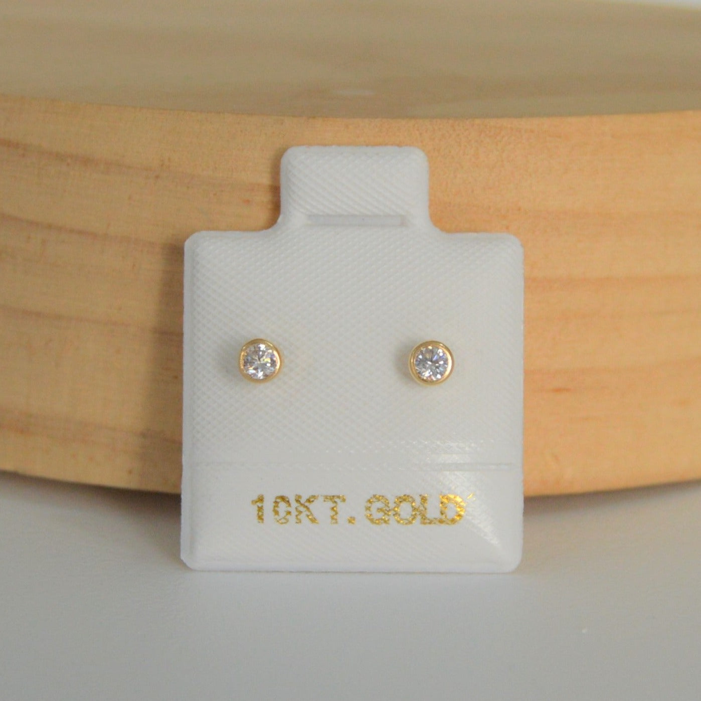 Tambor zirconia blanca oro 10k